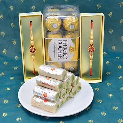 Seductive Sandalwood Swastik Rakhi with Yummy Ferrero Rocher and Delicious Kaju Roll Hamper