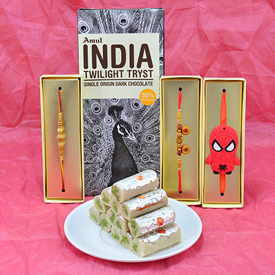 Magnificent Sandalwood Beads Rakhi with Spidermen Kids Rakhi and delicious Amul India Chocolate with Tasty Kaju Roll