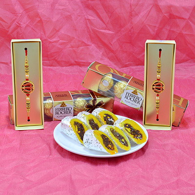 Stunning Eye Catching Trishul Rakhi with succulent Kaju Raj Bahar and Luscious Ferrero Rocher