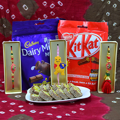 Spectacular Bhaiya Bhabhi Rakhi with Kids Rakhi and Delicious Cadbury Dairy Milk with Nestle Kitkat Chocolates with Luscious Anjeer Chakra