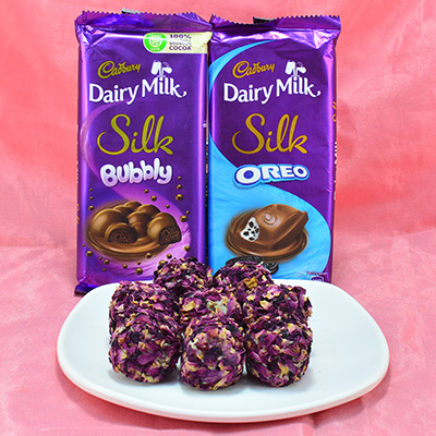 Flavorsome Kaju Rose Laddu with Finger Licking Dairy Milk Silk Bubbly and Oreo Chocolate Hamper