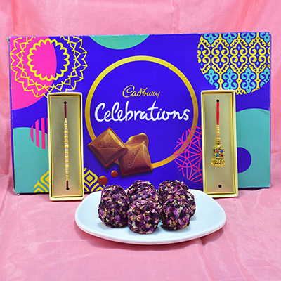 Amazing Golden Beads Bhaiya Bhabhi Rakhi with Luscious Kaju Rose Laddu along with Finger Licking Cadbury Celebrations