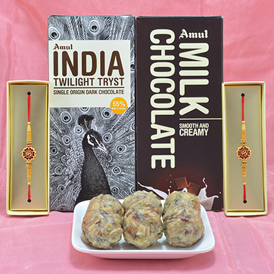 Luscious Dry Fruit Laddu with Finger Licking Amul Chocolates along with Amazing Sandalwood OM Divine Rakhi 