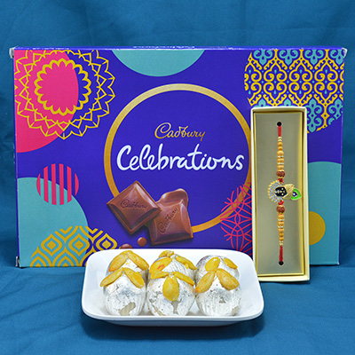 Mouthwatering Kaju Badam Laddu with Finger Licking Cadbury Celebartions along with Golden Theme Rakhi Hamper