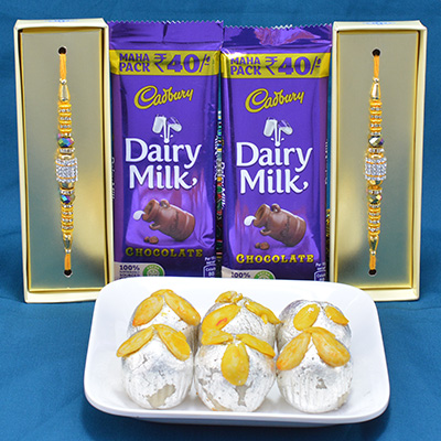 Piquant Kaju Badam Laddu with Yummy Cadbury Dairy Milk Chocolates along with Diamond Jewel Rakhi Hamper
