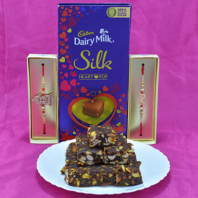 Alluring Brother Rakhi with Delicious Cadbury Dairy Milk Silk Chocolate along with Luscious Anjeer Dry Fruits Hamper