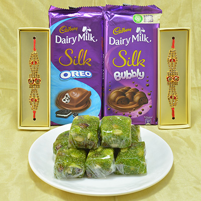 Piquant Kaju Anjeer Halwa with Luscious Cadbury Dairy Milk Silk Chocolate along with Attractive Diamond Jewel Rakhi Hamper