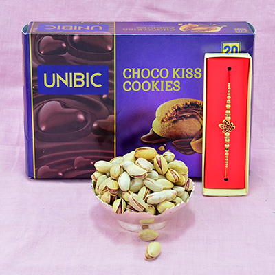 Magnificent Sandalwood Ganesh Rakhi with Luscious Pista Dry Fruit and Yummy Choco Kiss Cookies