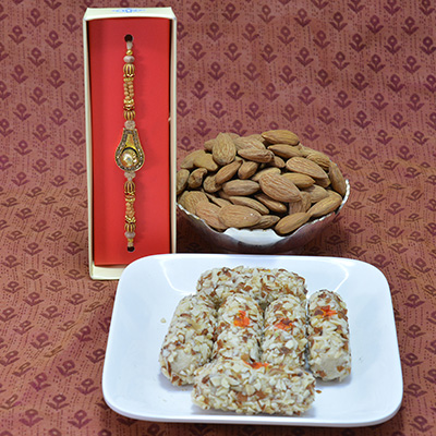 Savory Kaju Butterscotch Roll with Delicious Badam Dry Fruits along with Amazing Shivling Beads Rakhi Hamper