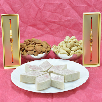 Piquant Badam Barfi with Delicious 2 Types of Dry fruit along with Divine Rakhi Hamper