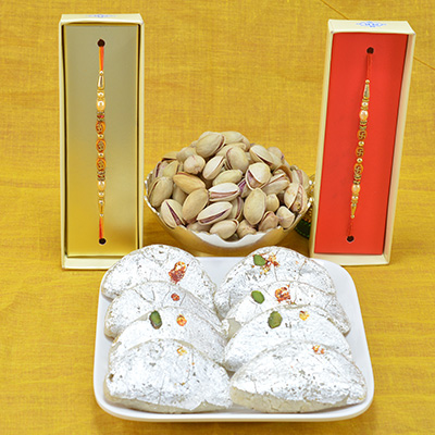 Flavorsome Kaju Gujia with Delicious Pista Dry Fruit along with Awesome Divine Rakhi Hamper