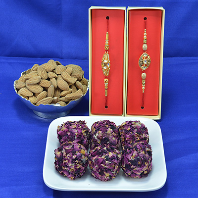 Mouthwatering Kaju Rose Laddu with Savory Almond Dry Fruit along with Diamond Jewel Rakhi Hamper