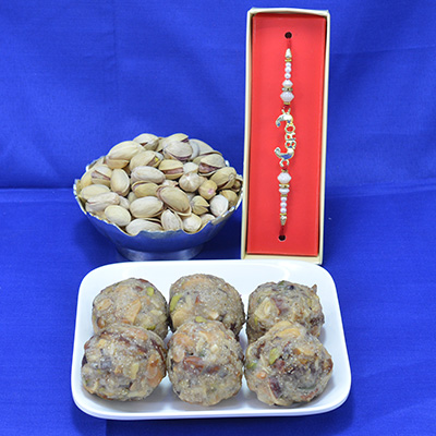 Tasty Kaju Dry Fruit Laddu with Luscious Pista Dry Fruit along with Attractive Bro Rakhi Hamper