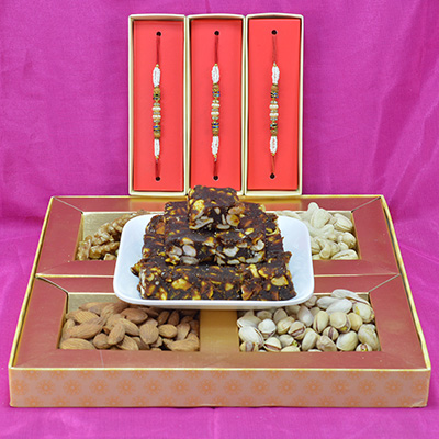 Appetizing Anjeer Dry Fruits with Tasty and Healty Mix Dry Fruit Box along with Multicolor Pearl Beads Rakhi Hamper