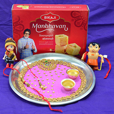 Eye Catching Purple Theme Pooja Thali Rakhi with Kids Rakhi and Tasty Bikaji Manbhavan Soanpadi