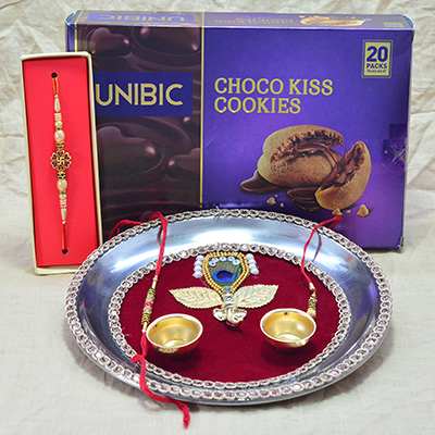 Amazing Eye Catching Crafted Pooja Thali with Swastik Rakhi and Delicious Choco Kiss Cookies