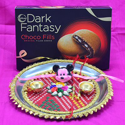 Rajasthani Design Attractive Looking Puja Thali with Rakhis and Branded Sunfiest Dark Fantasy Choco Fills