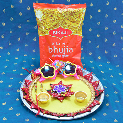 Bikaneri Bhujia by Bikaji Small Packet of Namkeen with Family Rakhis Hamper and Amazing Looking Yellow Base Rakhi Puja Thali