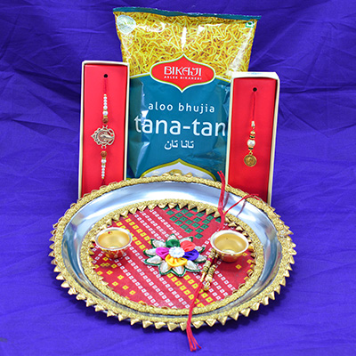 Aloo Bhujia Namkeen of Small Packet with Amazing Rakhis and Flower Studded Pooja Thali for Raksha Bandhan