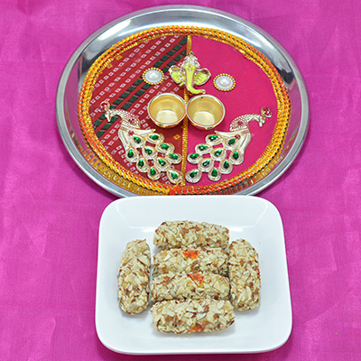 Traditional Mayur Jewel Pooja Thali with Savory Kaju Butterscotch Roll Hamper