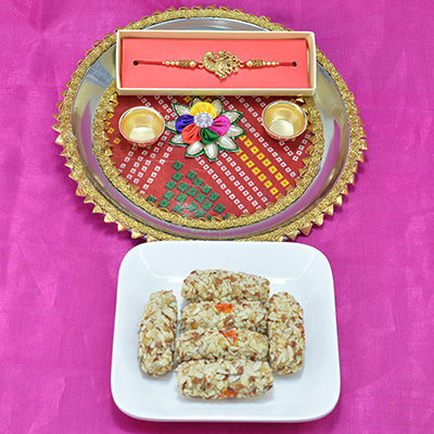 Succeulent Kaju Butterscotch Roll with Traditional Chunri Flower Design Pooja Thali