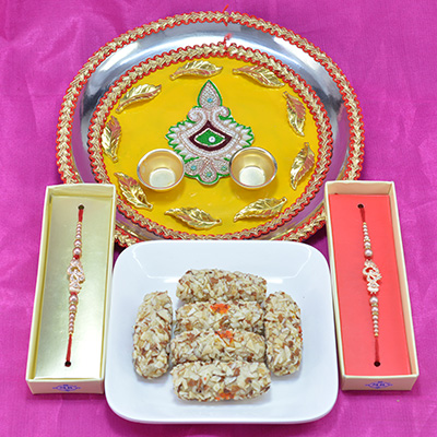 Gorgeous Deepak Crafted Pooja Thali Rakhi with Luscious Kaju Butterscotch Roll along with Beads Rakhi Hamper