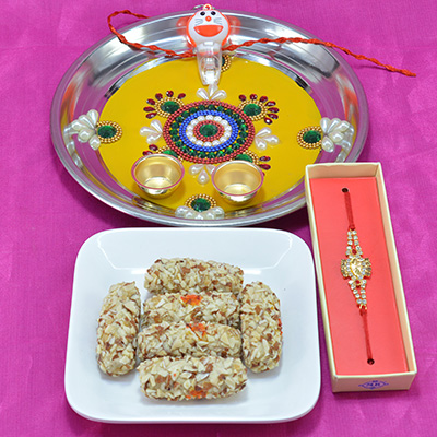 Illustrious Multicolor Beads Pooja Thali with Savory Kaju Butterscotch Roll Hamper