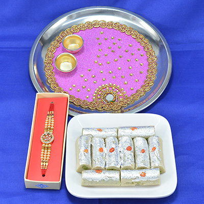 Amazing Crafted Mirror Stud Pooja Thali with Savory Kaju Roll along with Diamond Jewel Rakhi