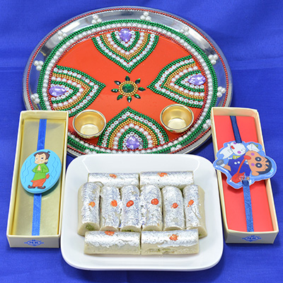 Beautiful Colorful Beads Pooja Thali with Savory Kaju Roll along with Kids Rakhi