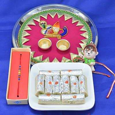 Awesome Peacock Crafted Pooja Thali with Luscious Kaju Roll along with Stunning Colorful Beads Rakhi