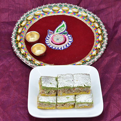 Eye Catching Crafted Pooja Thali with Delicious Badam Pista Barfi