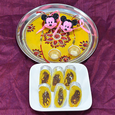 Mouthwatering Kaju Rajbahar Sweet with Eye Catching Flower Design Rakhi Pooja Thali