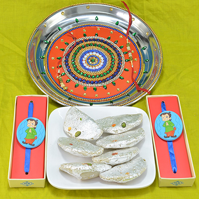 Beautifully Crafted Pooja Thali with Savory Kaju Gujia along with Chhota Bheem Rakhi