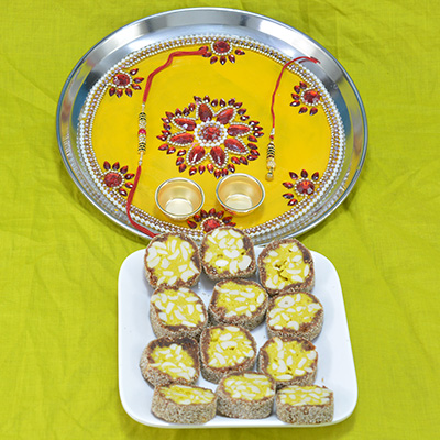 Piquant Kaju Anjeer Pista Barfi along with Gorgeous Flower Beads Design Pooja Thali