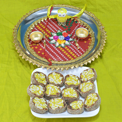 Marvelous Traditional Chunri Crafted Pooja Thali with Yummy Kaju Anjeer Barfi
