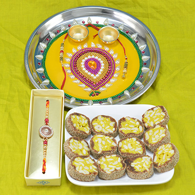 Wonderfully Beads Crafted Pooja Thali with Savory Kaju Anjeer Dry fruit and Rakhi Hamper