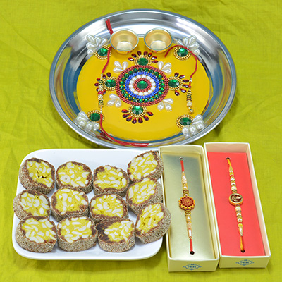 Beautifully Designed Pooja Thali with Luscious Kaju Anjeer Dry fruit and Rakhi Hamper