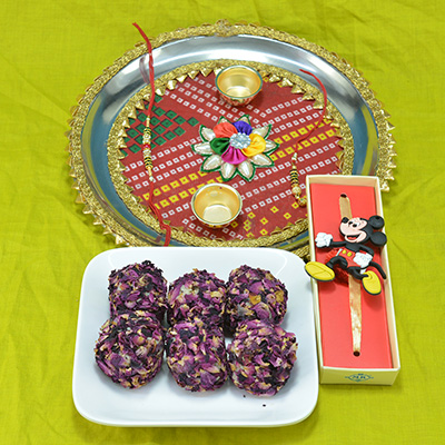 Delicious Kaju Rose Laddu with Stunning Flower Crafted Traditional Chunri Pooja Thali and Kids Rakhi