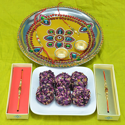 Savory Kaju Rose Laddu with Beautifully Diamond Crafted Pooja Thali along with Rudrakhsa Beads Rakhi