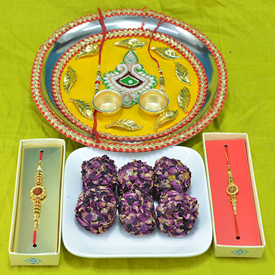 Illustrious Beads Deepak Yellow Base Pooja Thali with Delicious Kaju Rose Laddu along with 2 Attractive Rakhi