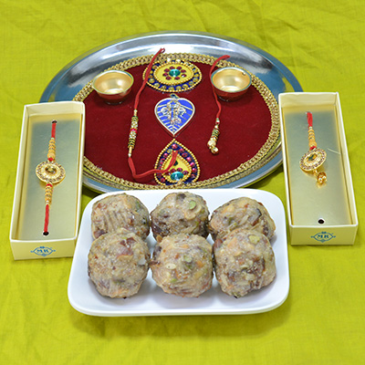 Gorgeous Bhaiya Bhabhi Rakhi with Luscious Kaju Dry Fruit Laddu along with Beautifully Crafted Pooja Thali