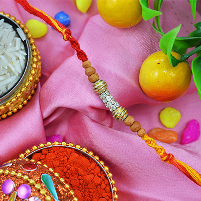 Awesome Sandalwood Rakhi with Multi-Color Graceful Silk Thread