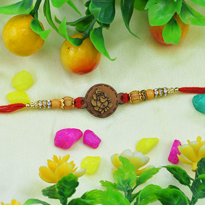 Prodigious Sandalwood Ganesh Rakhi Alluring Tiny Beads