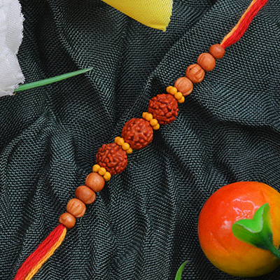 Three Awesome Rudraksha Sandalwood Rakhi and Multicolor Silk Dori with Eye-Catching Beads