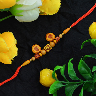 Fascinating Square and Rounded Sandalwood OM Rakhi and Unique Rudraksha with Silk Thread