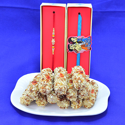 Delicious Kaju Butterscotch Roll with Gorgeous Multicolor Beads Rakhi with Chhota Bheem with Princess Rakhi