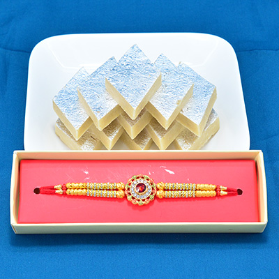 Diamond Stud Round Shape Golden Beads Rakhi with Luscious Kaju Katli