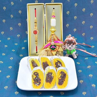 Bhaiya Bhabhi and Kid Toy Rakhi Set with Delicious Mouth Watering Kaju Raj Bahar Sweet