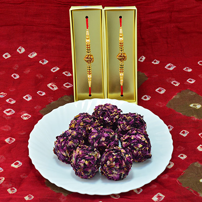 Appetizing Kaju Rose Laddu with Amazing Multicolor Beads Rakhi