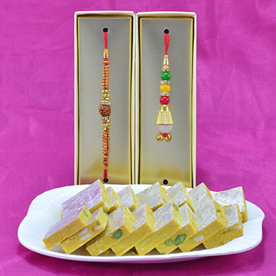 Rudraksha Auspicious Rakhi with Colorful Lumba Rakhi Set and Branded Kaju Kesar Pista Barfi Sweet